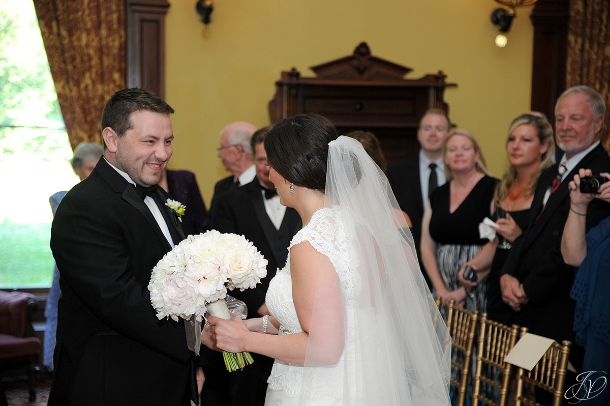 bride and groom greeting at the front of the ceremony