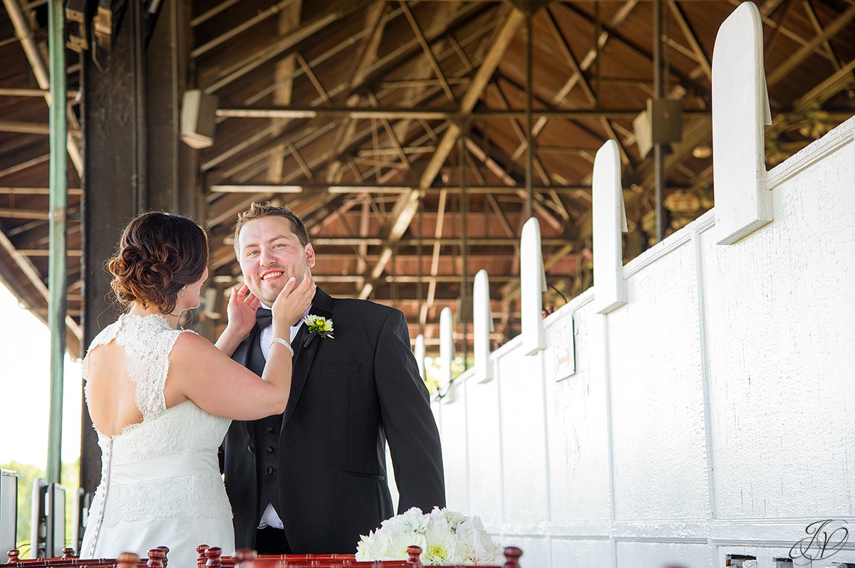bride and groom at saratoga race track