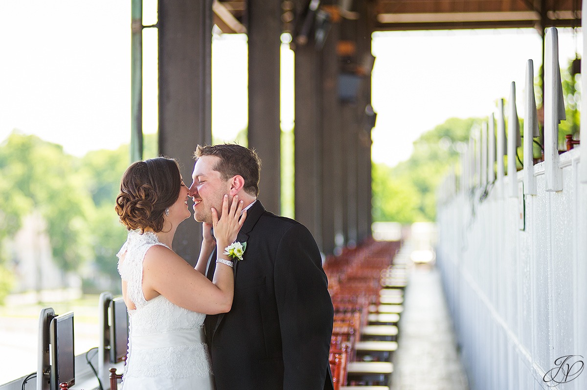 romantic photo of bride and groom at saratoga race track