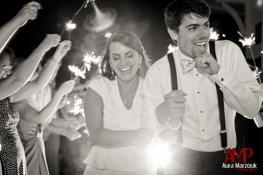 Fun sparkler exit from the Summit Dining Hall. Summit Dining Hall wedding photography by Aura Marzouk Photography.