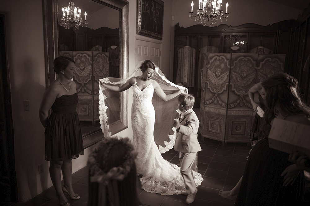 Corral de Tierra bride with lace veil at Carmel Mission
