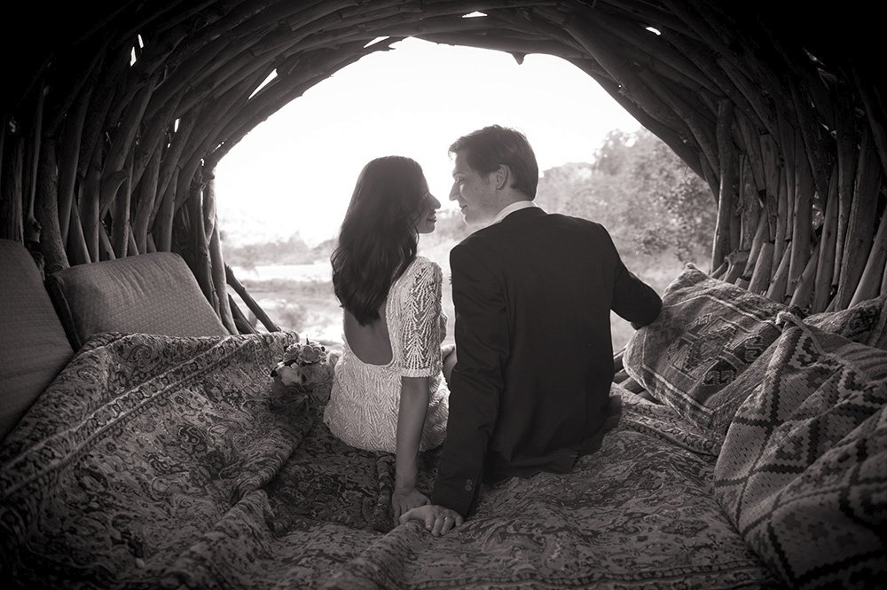 Bride in backless wedding gown in wedding treehouse