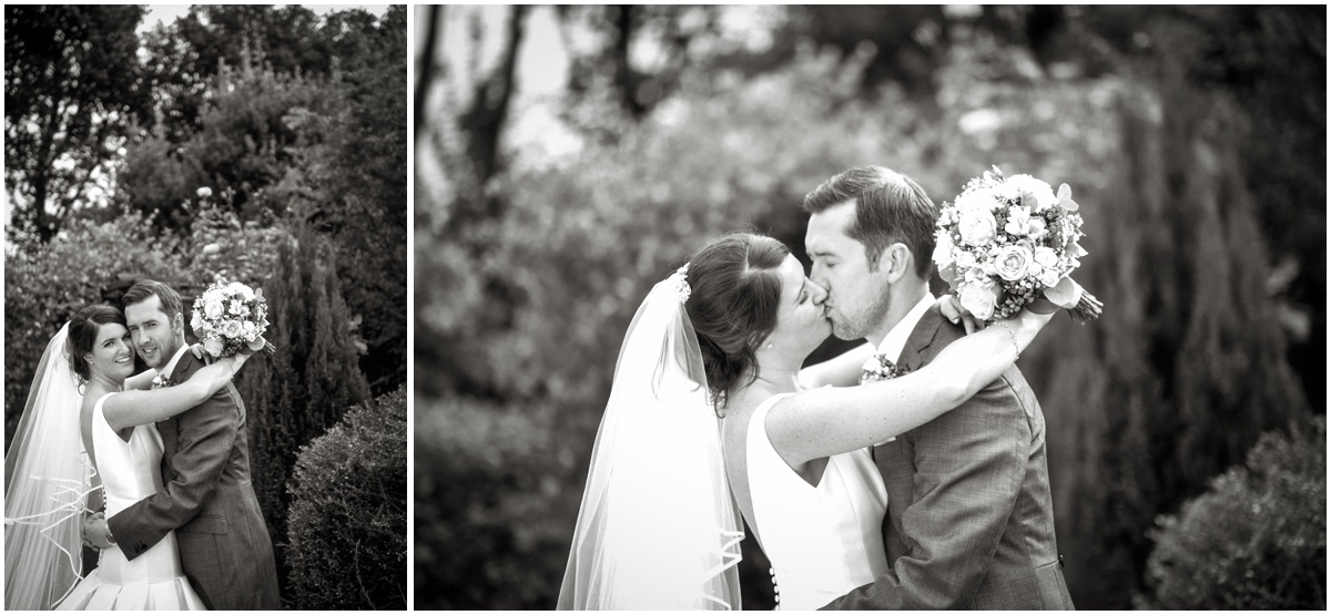 Wedding couple kissing' black and white