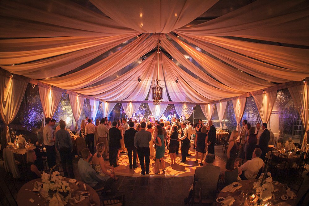 Dancing underneath Sailcloth tent at Monterey wedding reception