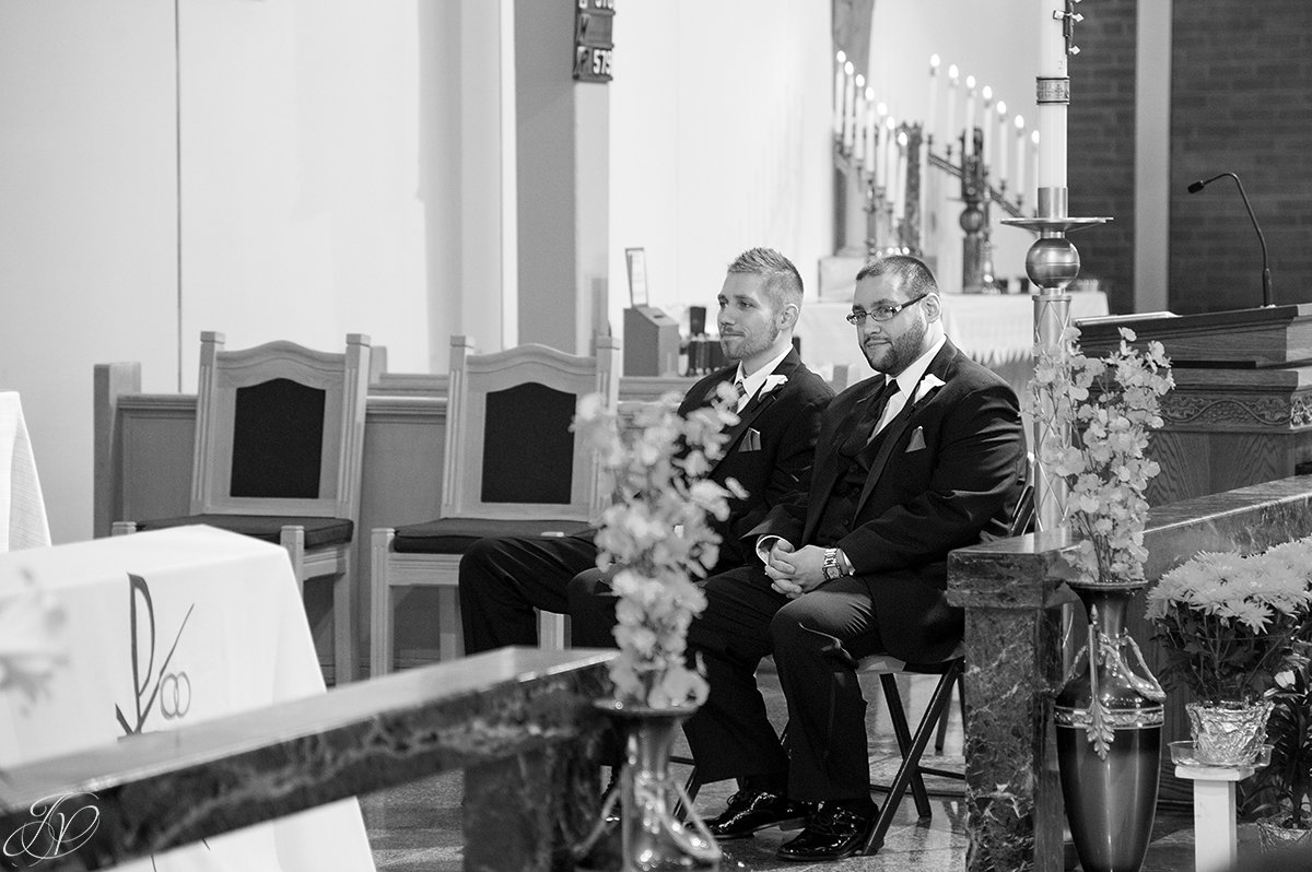 groom looking at bride during ceremony