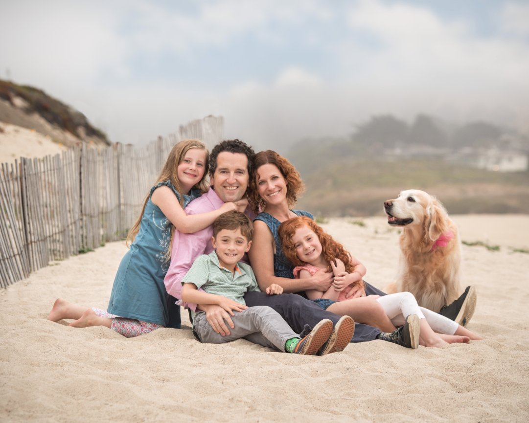 Family portrait with dog at Carmel Beach
