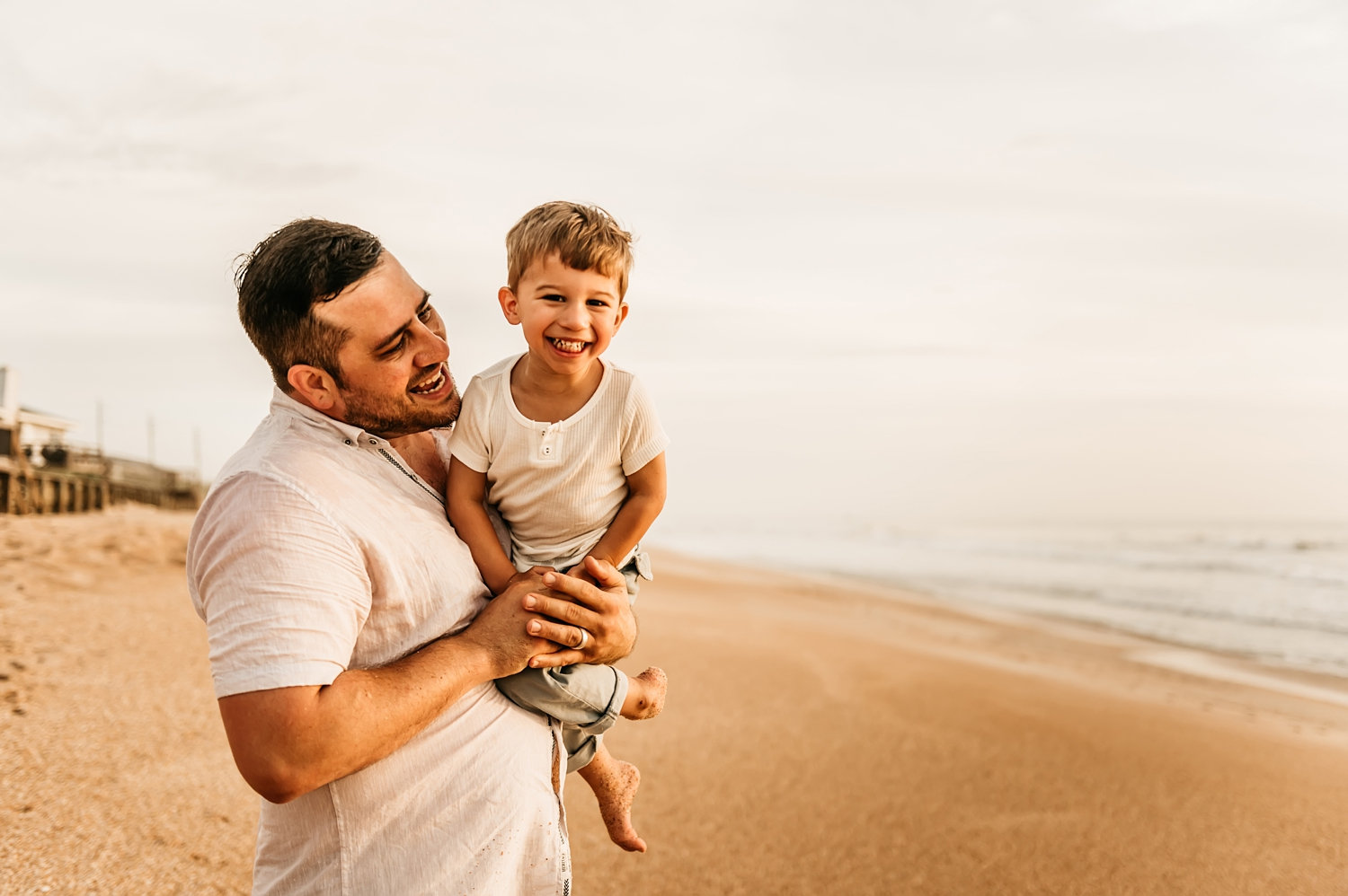 father and son at sunrise, St. Augustine Beach, vacation photography, Rya Duncklee Photos