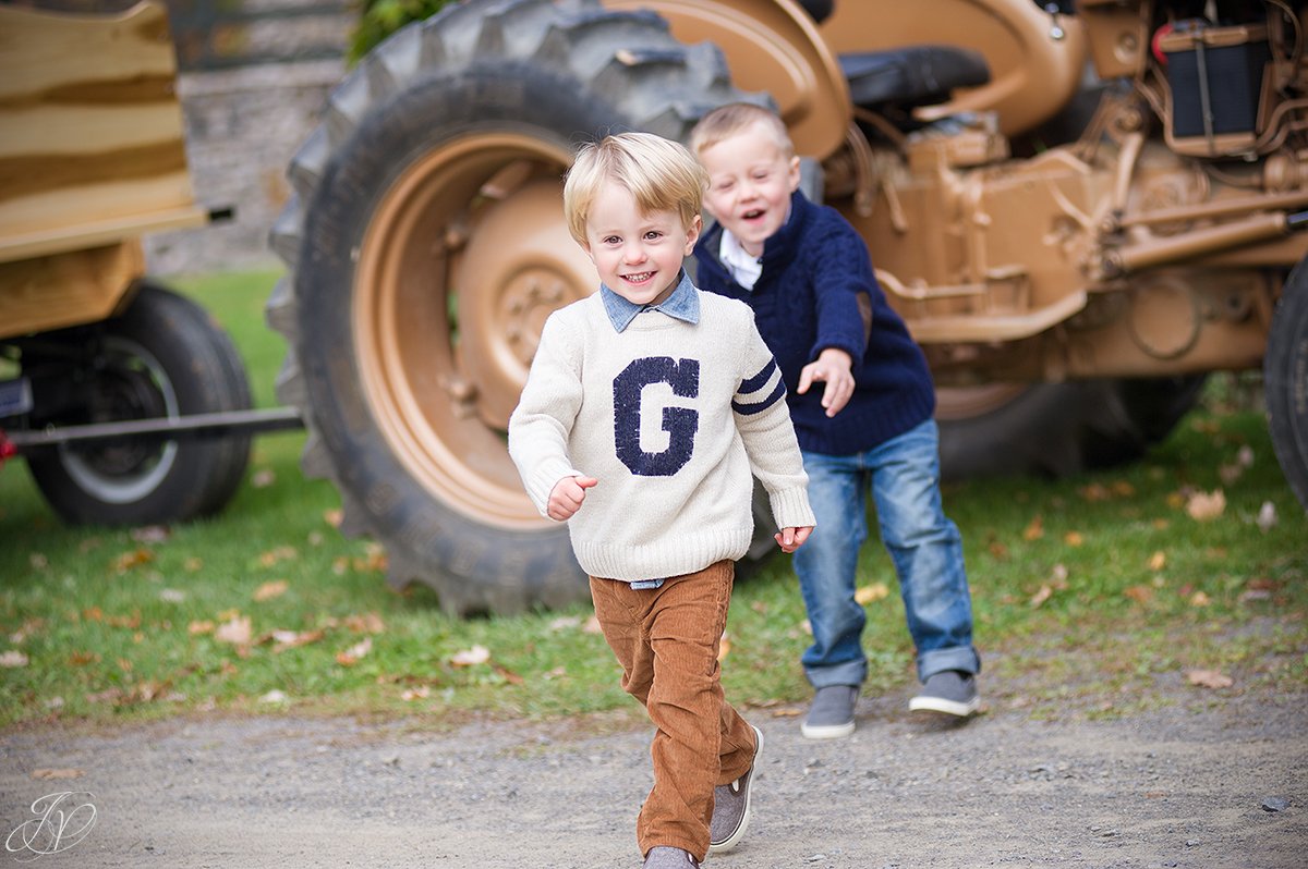 adorable photo of kids near tractors