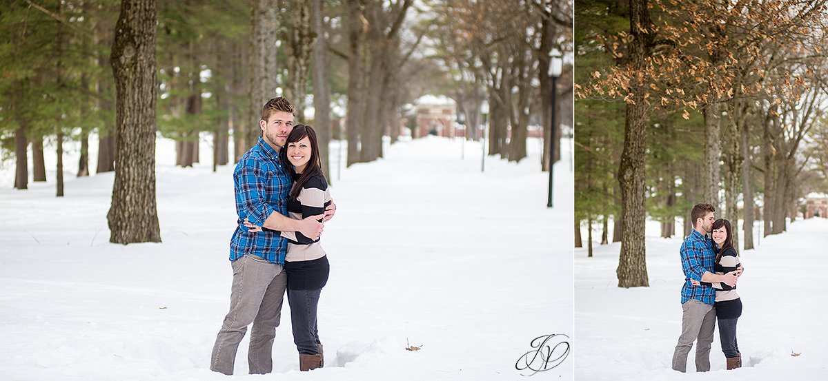 romantic photo of engaged couple in the snow