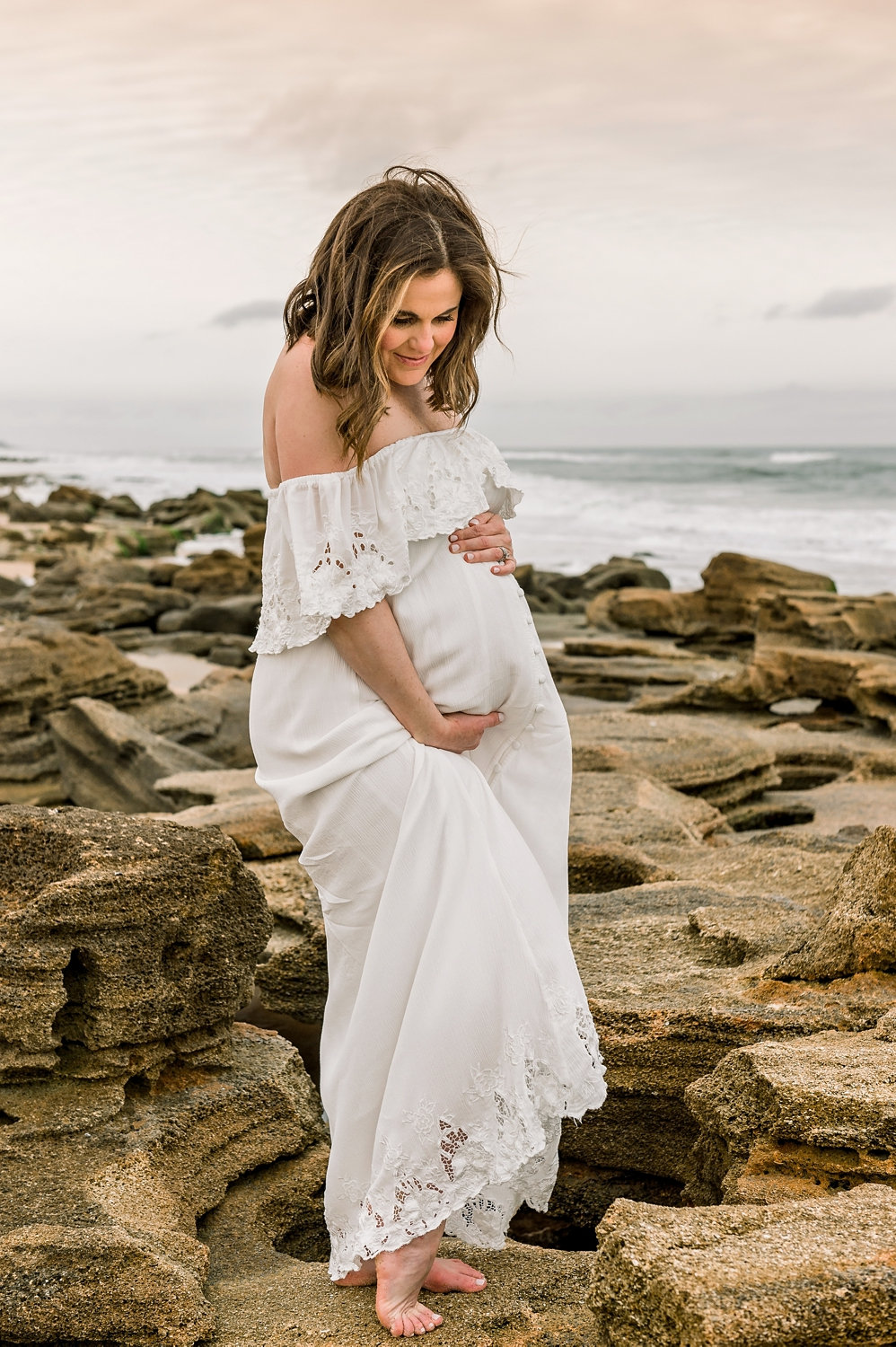 rocky beach in Florida, Ponte Vedra Beach, Ryaphotos, moody beach maternity session