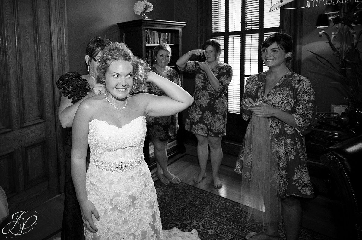 Saratoga Wedding Photographer, getting wedding dress on, getting ready wedding photo, The Mansion Inn rock city falls