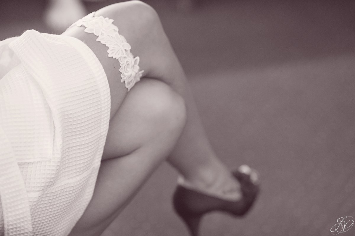 bridal garter on bride leg