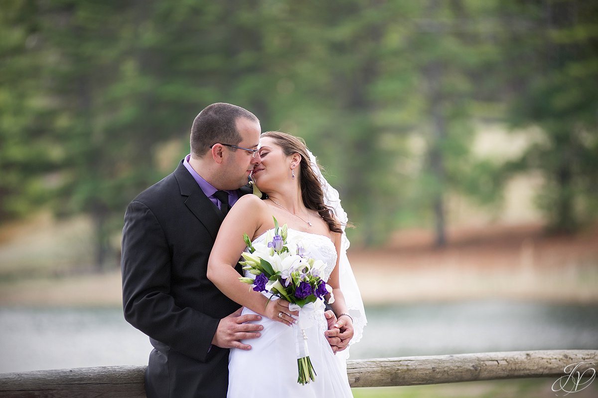 romantic bride and groom kissing photo