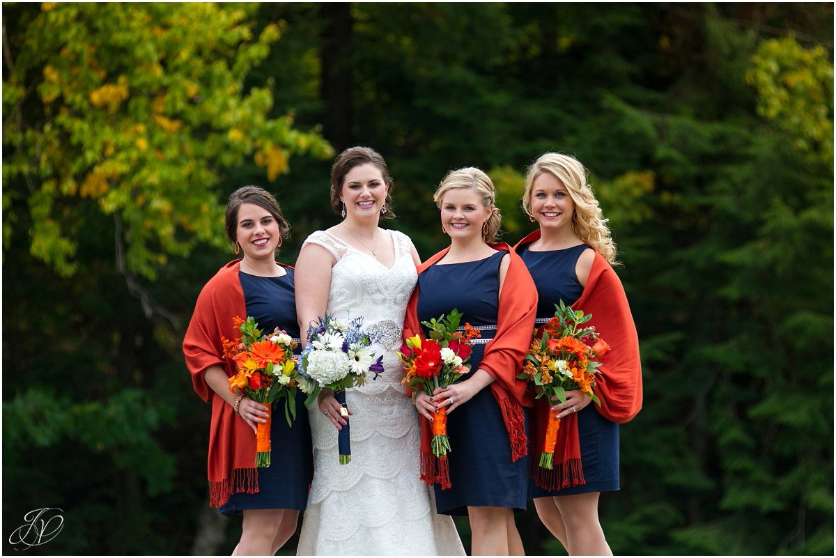 fall bridal portrait dark blue orange wraps