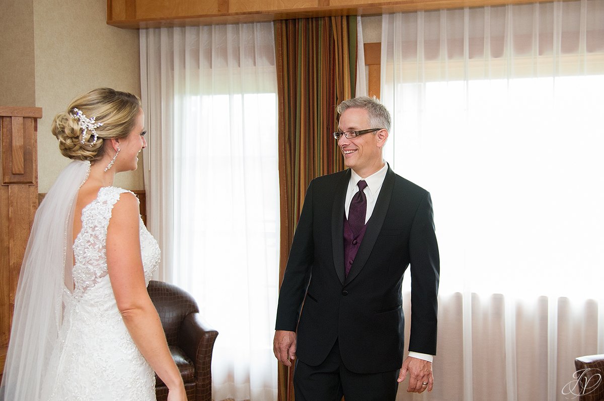 bride first look with father