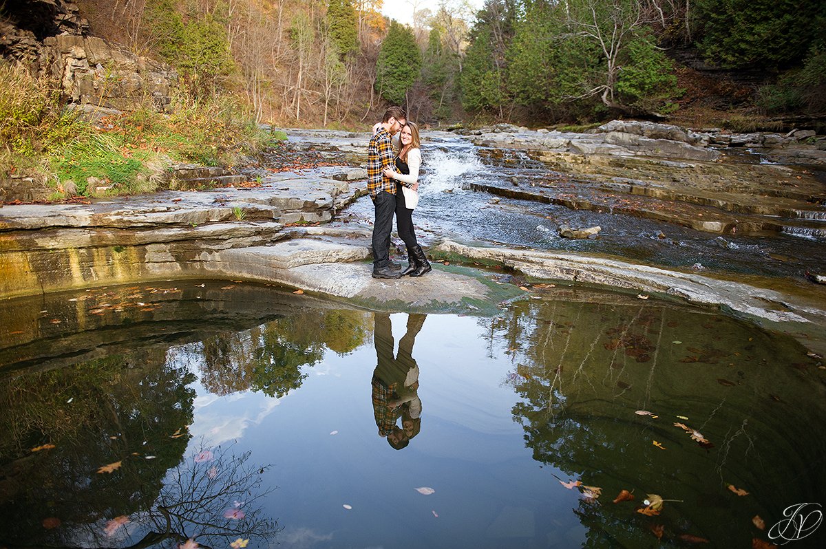 romantic fall engagement pictures water reflection