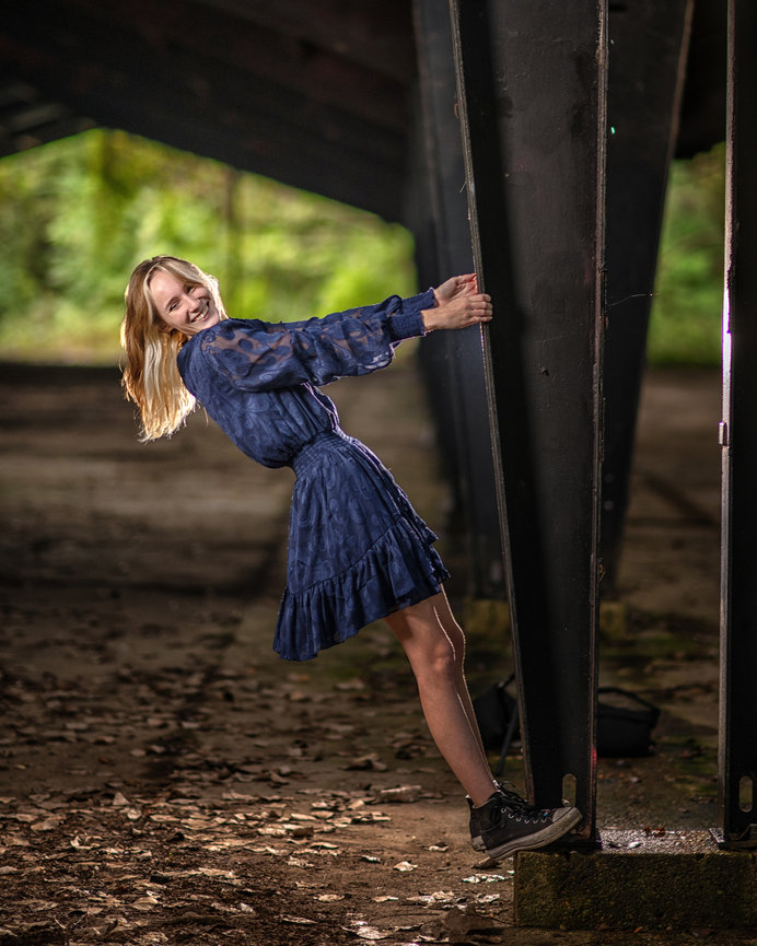 Senior portrait at downtown Houston rooftop, candid cinematic session, Swartz Portraits Conroe TX serving Spring ISD