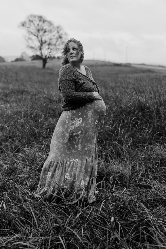 Outdoor maternity photoshoot pregnant woman in black and white in Huntsville, alabama