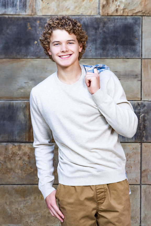 High school senior pictures guy cream sweater khaki pants Lewisville Texas