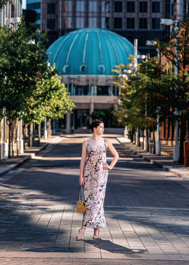 Downtown Dallas High School Senior Girl in Pencil dress standing in street.