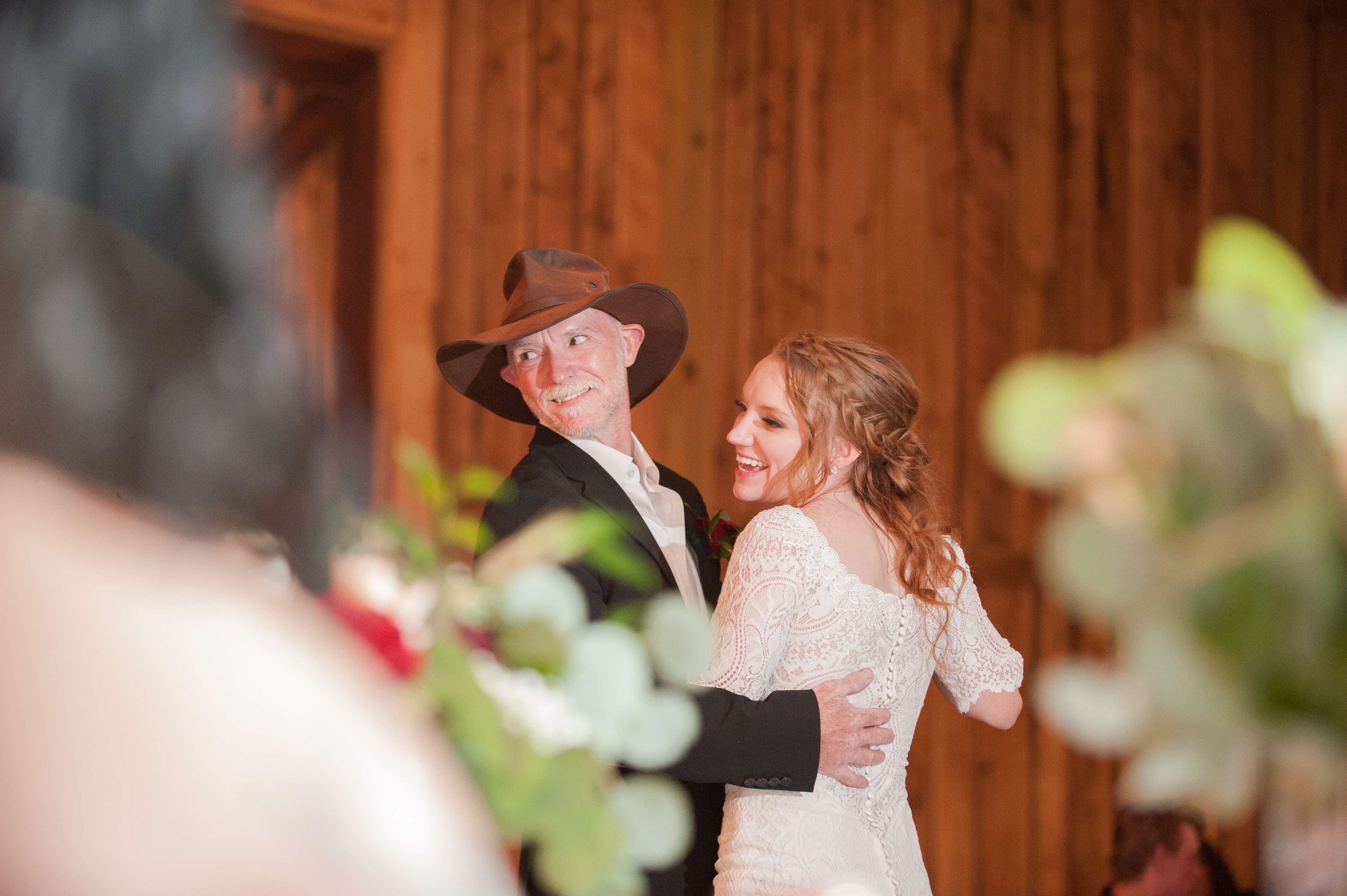 Father daughter dance at wedding reception near Springfield, Missouri.