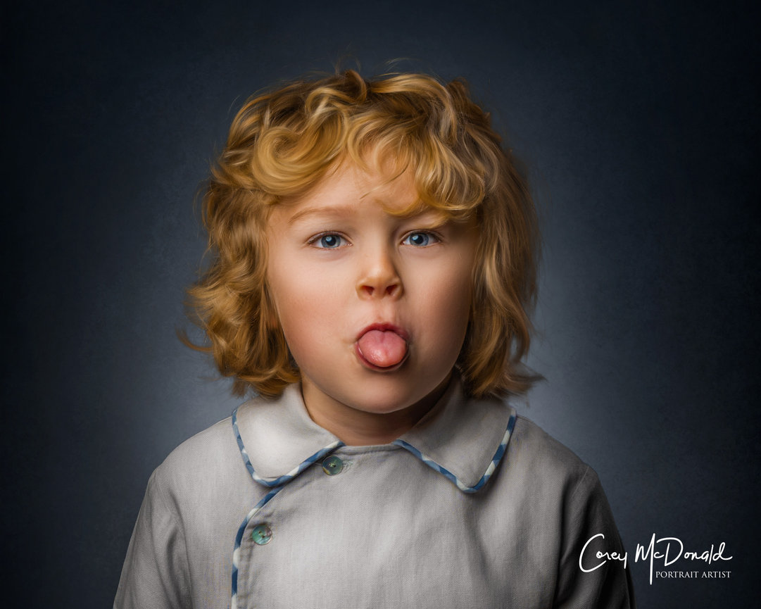 Young child with curly hair sticking out tongue playfully, wearing a light outfit against a dark background.