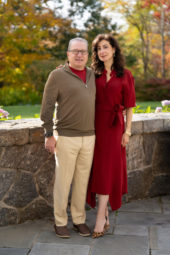 Couple posing in a garden