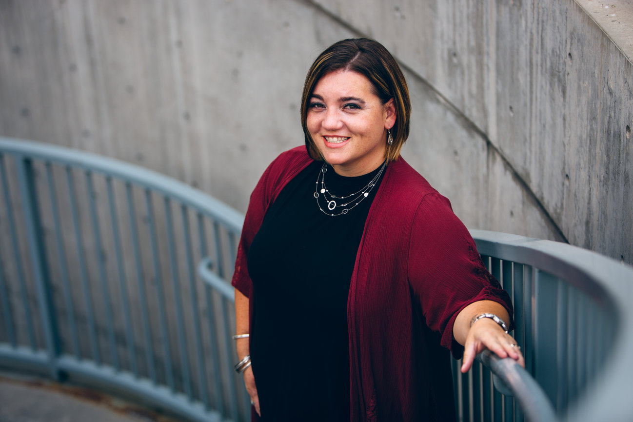 brand headshot of female in a stair way providing great composition