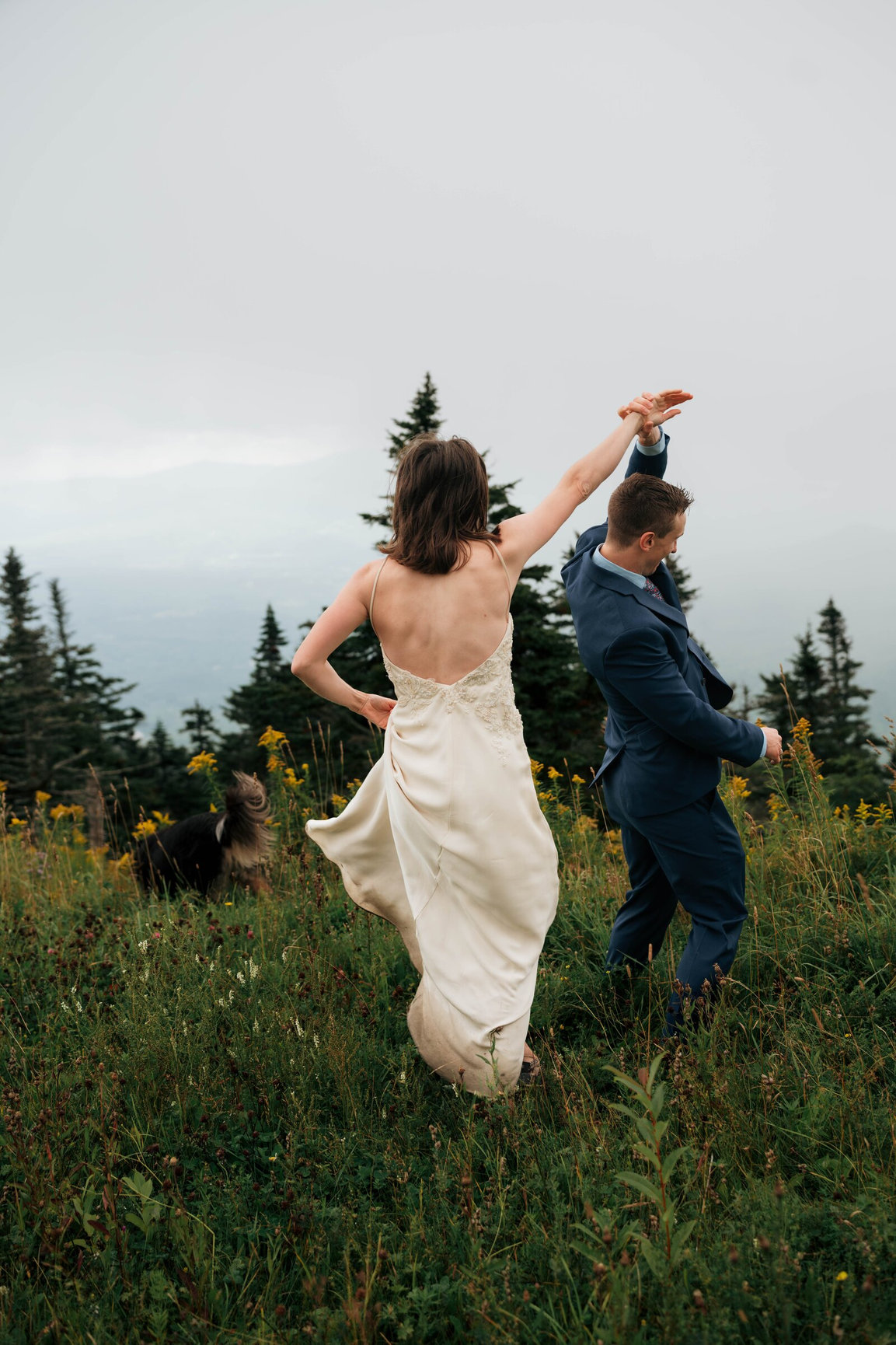Bride twirling on the summit of Mount Mansfield, Stowe VT