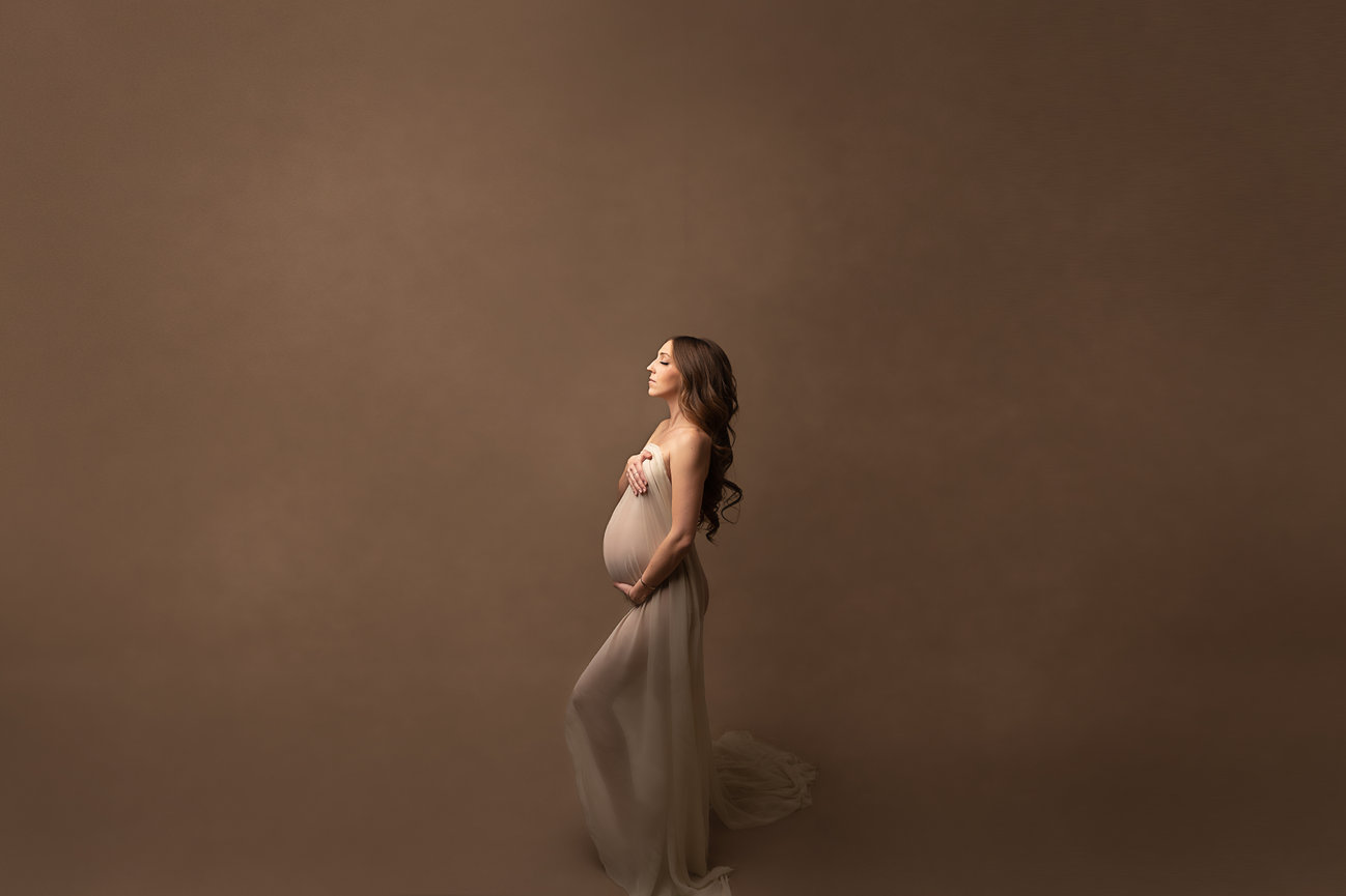 High-end pregnancy photo with fabric and minimal styling, Union County, NJ