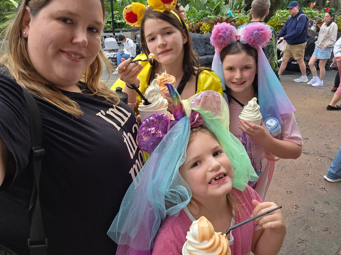 Family posing with ice cream treats