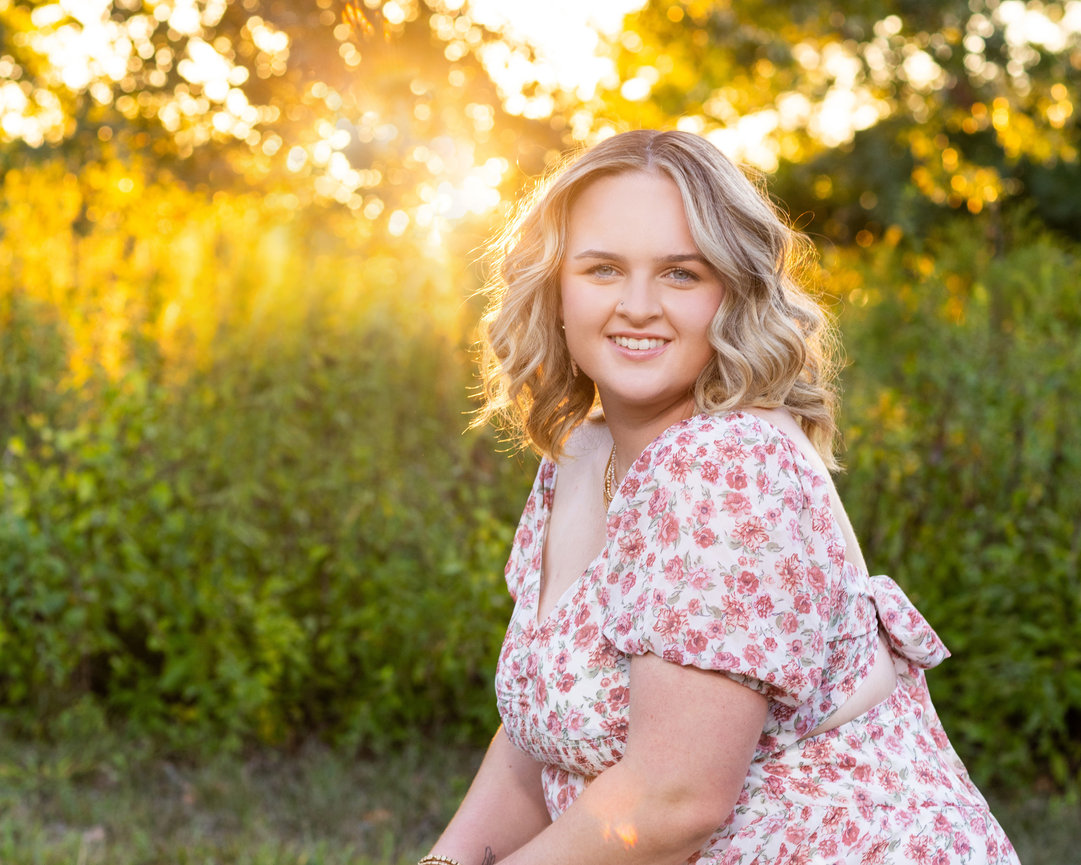 Blonde hair teen in golden sunlight