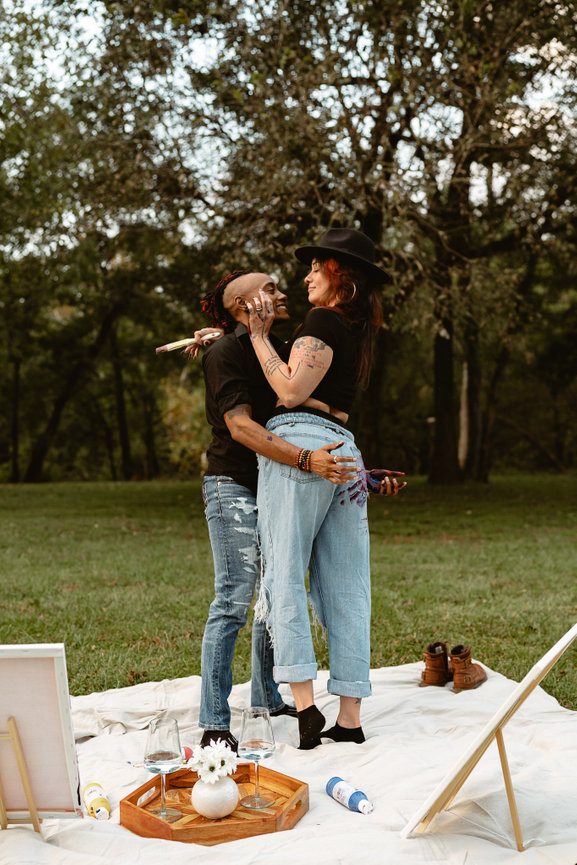 Couple enjoying a picnic in a field