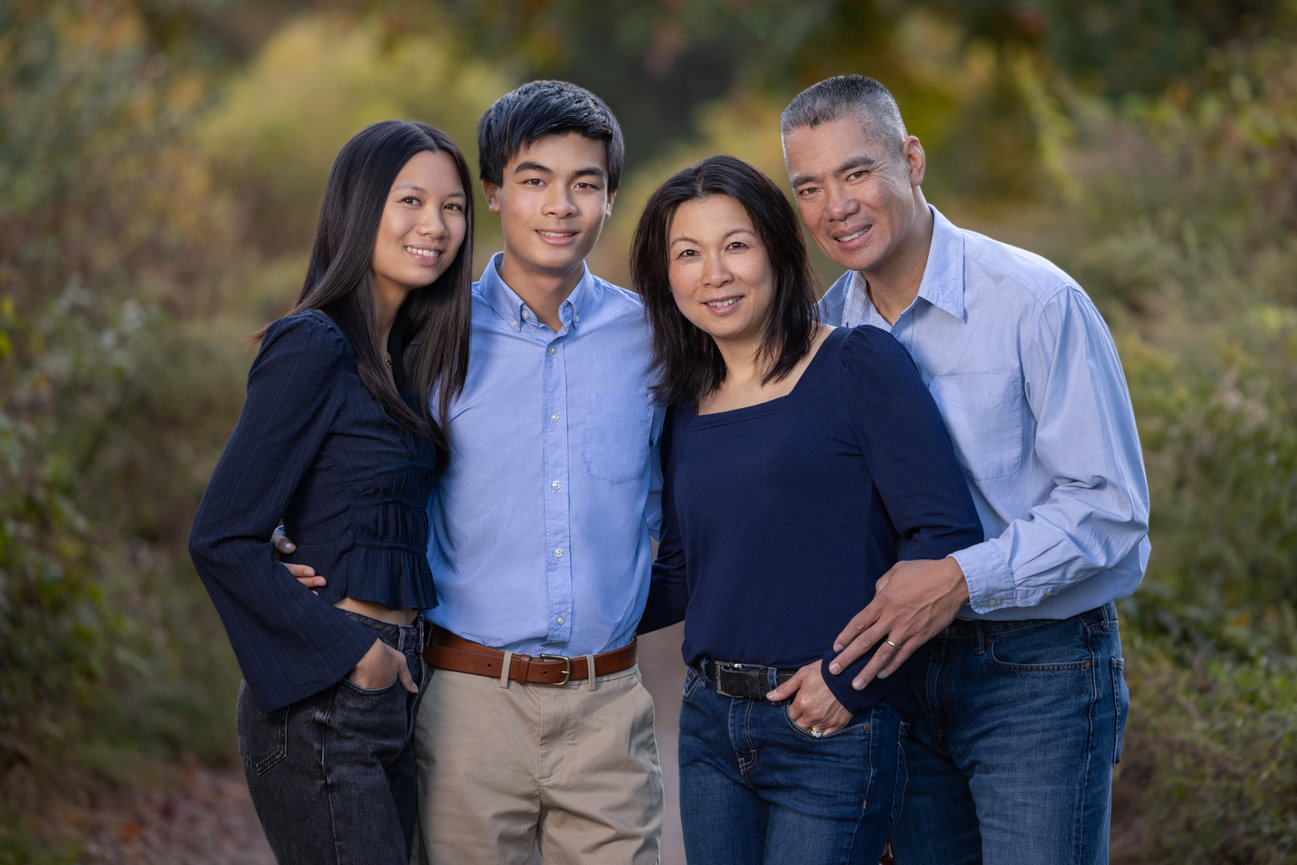 outdoor family portrait of mom and dad with boy girl high school senior twins with fall colors westwood ma