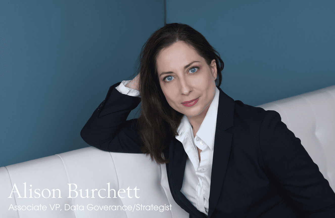 Data governance and strategist Alison poses in a black suit jacket for her business branding session at Kliks Photography in Cedar Rapids, Iowa.