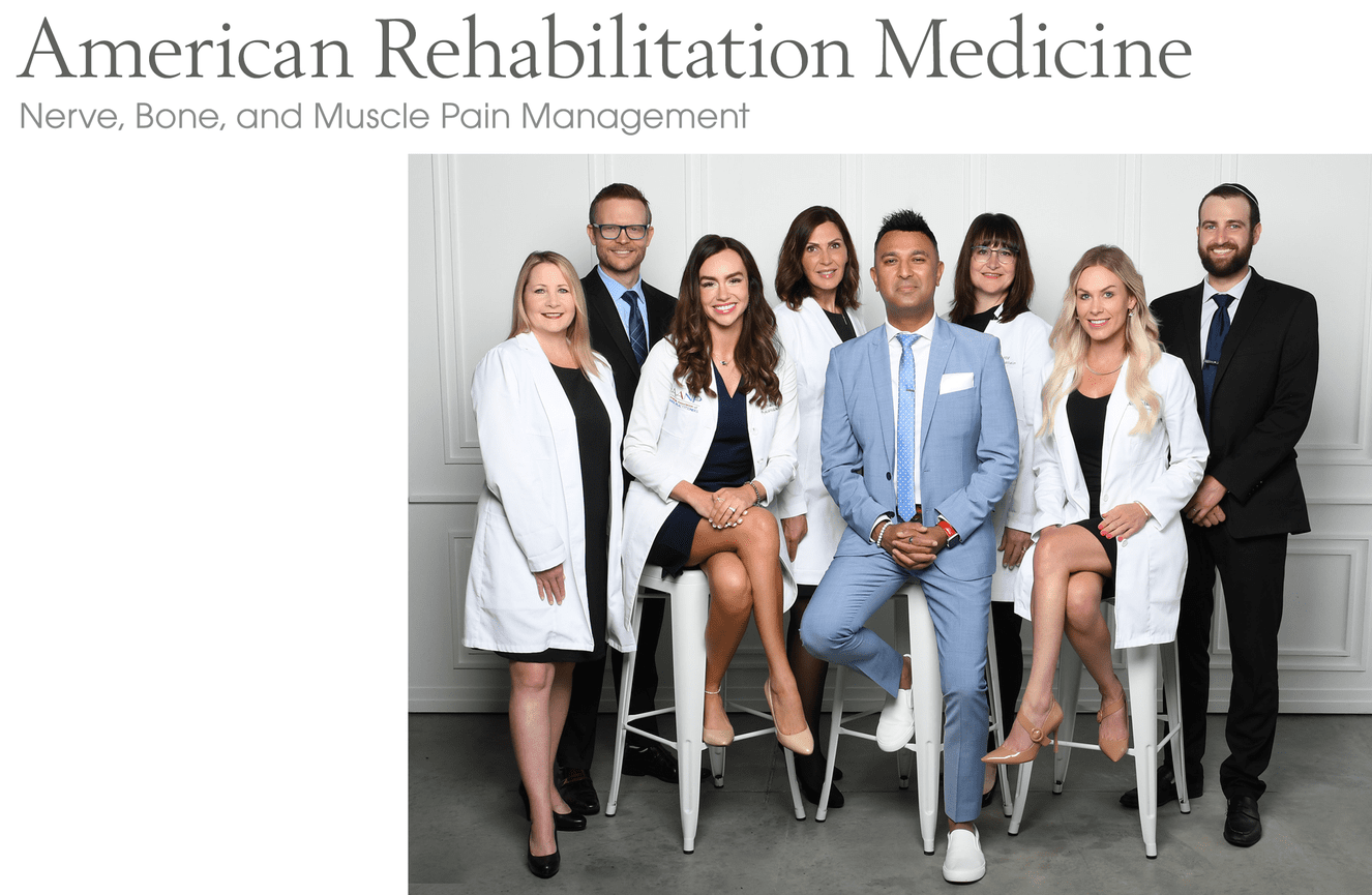 Eight American Rehabilitation Medicine doctors and nurses wearing lab coats.